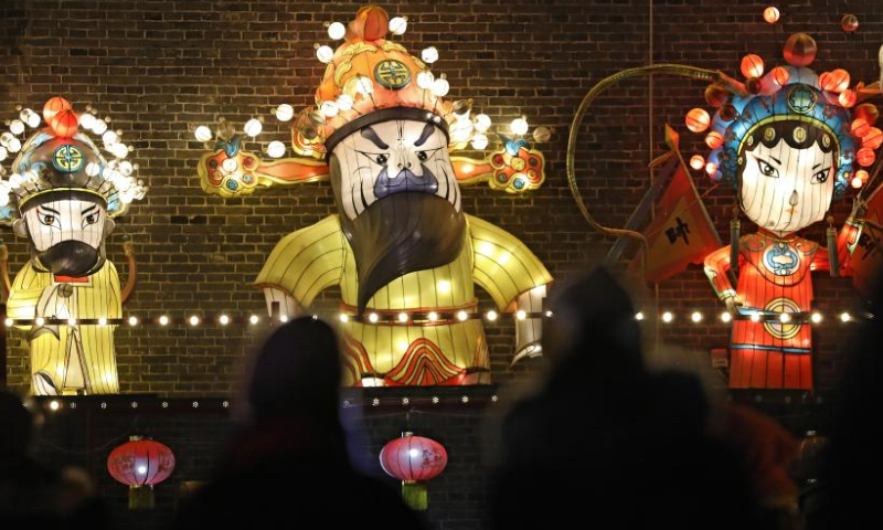 Tourists view lanterns at Liaohe ancient street in Yingkou, northeast China's Liaoning Province, Feb. 3, 2023. The Liaohe ancient street has been decorated with various lanterns to greet the Lantern Festival, the 15th day of the first month of the Chinese lunar calendar, which falls on Feb. 5 this year. Photo: Xinhua