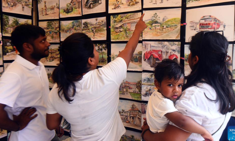 People visit the Kala Pola, an annual open-air art exhibition, in Colombo, Sri Lanka, Feb. 19, 2023. Photo: Xinhua