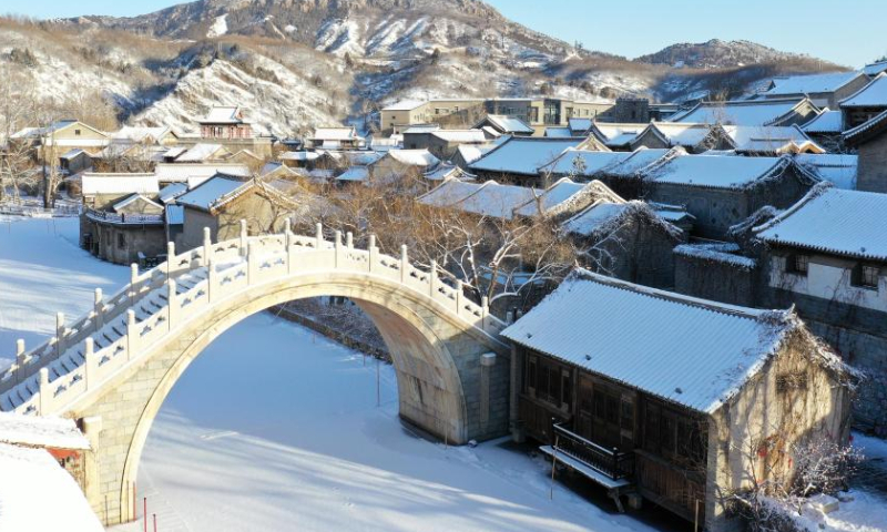 This aerial photo taken on Feb. 19, 2023 shows snow scenery of the Gubei Water Town in Beijing, capital of China. Photo: Xinhua