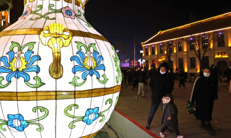 Tourists view lanterns at Liaohe ancient street in Yingkou, northeast China's Liaoning Province, Feb. 3, 2023. The Liaohe ancient street has been decorated with various lanterns to greet the Lantern Festival, the 15th day of the first month of the Chinese lunar calendar, which falls on Feb. 5 this year. Photo: Xinhua