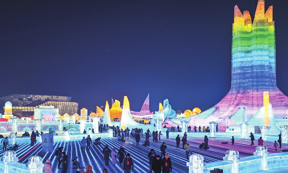 People visit ice sculptures at the Harbin Ice and Snow World in Harbin, Northeast China's Heilongjiang Province, on January 5, 2023, as the Harbin International Ice and Snow Festival kicks off that day. Photo: VCG 