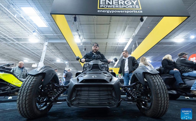 People visit the 2023 North American International Motorcycle Supershow in Mississauga, the Greater Toronto Area, Canada, on Jan. 7, 2023. This annual event is held here from Friday to Sunday with over 1,000 motorcycles from above 500 exhibitors. (Photo by Zou Zheng/Xinhua)