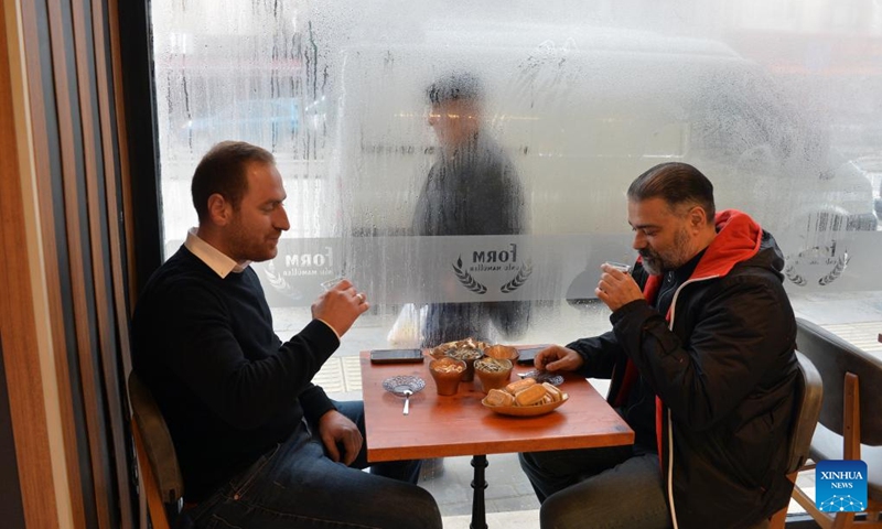 People drink tea at a cafe in Ankara, Türkiye, Jan. 6, 2023. (Photo by Mustafa Kaya/Xinhua)