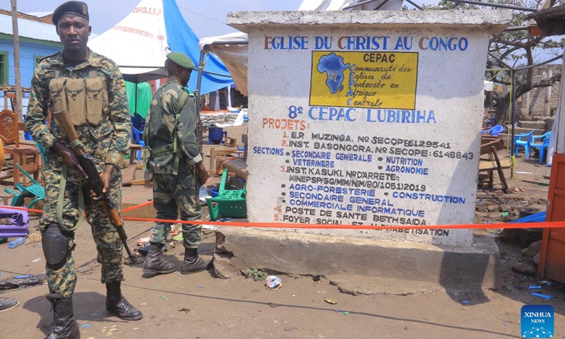 Security forces stand guard at the scene of an improvised explosive device attack at a church in Kasindi, North Kivu province, the Democratic Republic of the Congo (DRC), on Jan. 16, 2023. At least ten people were killed in the improvised explosive device attack here on Sunday, said a local army spokesman.(Photo: Xinhua)