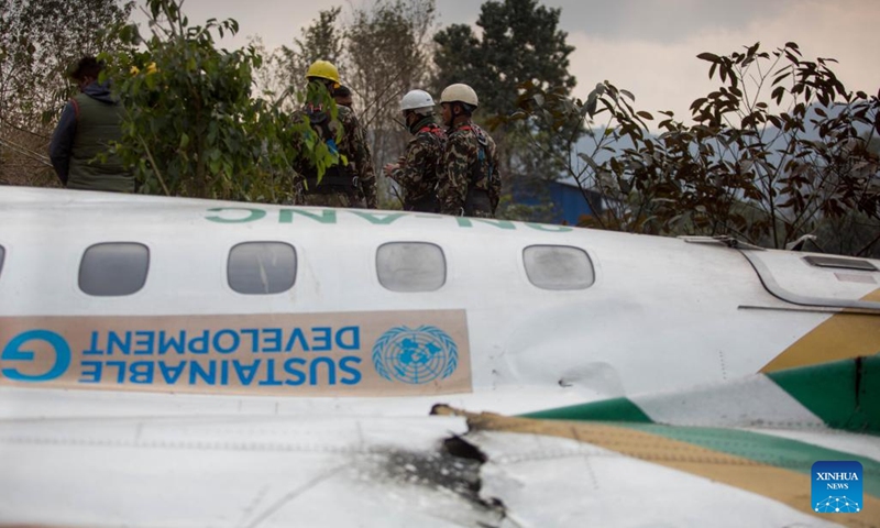 The wreckage of an ATR-72 aircraft of Nepal's Yeti Airlines is pictured at the crash site in Pokhara, Nepal, Jan. 16, 2023. Two black boxes of a crashed passenger plane and one more body were retrieved on Monday at the crash site in central Nepal, bringing the death toll to 69, a local official said. (Photo: Xinhua)