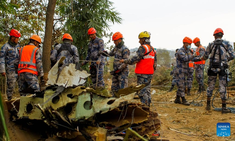 Rescuers work at the site where an ATR-72 aircraft of Nepal's Yeti Airlines crashed in Pokhara, Nepal, Jan. 16, 2023. Two black boxes of a crashed passenger plane and one more body were retrieved on Monday at the crash site in central Nepal, bringing the death toll to 69, a local official said.(Photo: Xinhua)