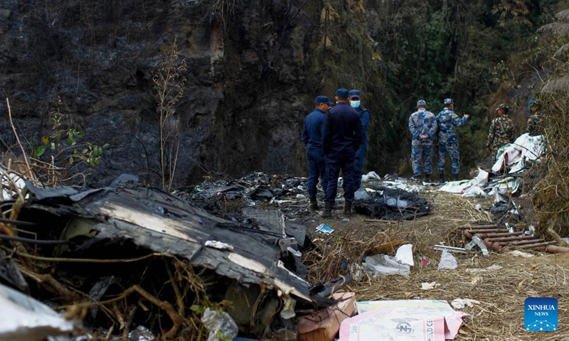 Rescuers work at the site where an ATR-72 aircraft of Nepal's Yeti Airlines crashed in Pokhara, Nepal, Jan. 16, 2023. Two black boxes of a crashed passenger plane and one more body were retrieved on Monday at the crash site in central Nepal, bringing the death toll to 69, a local official said.(Photo: Xinhua)