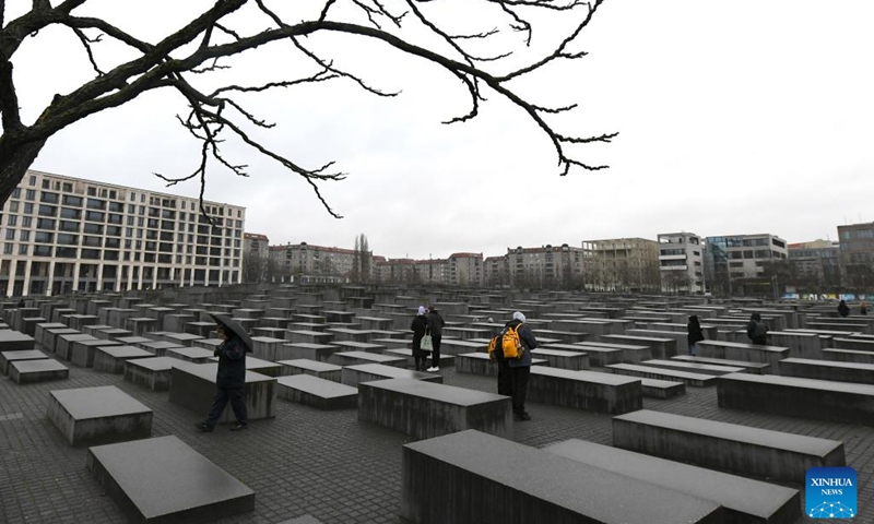 People visit the Memorial to the Murdered Jews of Europe in Berlin, Germany, Jan. 27, 2023. The memorial, located in the center of Berlin, was built to remember about 6 million Jews killed by the Nazis during World War II. In 2005, the UN General Assembly adopted a resolution which designated Jan. 27 as the International Day of Commemoration in Memory of the Victims of the Holocaust.(Photo: Xinhua)