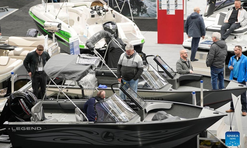 Visitors attend the 2023 Vancouver International Boat Show in Vancouver, British Columbia, Canada, on Feb. 1, 2023. The five-day boat show, featuring over 200 exhibitors from across the world, showcases a wide selection of boats and related accessories.(Photo: Xinhua)