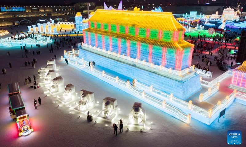 This aerial photo shows people visiting the Ice-Snow World theme park in Harbin, northeast China's Heilongjiang Province, Feb. 1, 2023. Harbin, known as China's ice city, has been attracting many tourists in winter tourism season.(Photo: Xinhua)