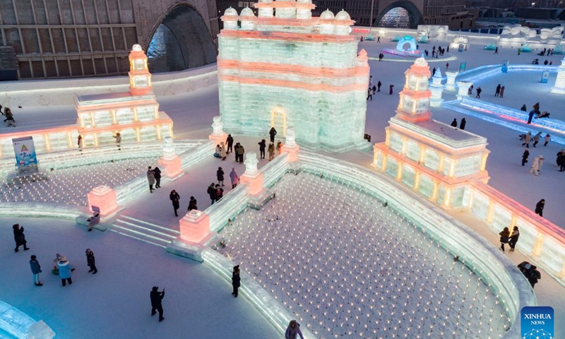 This aerial photo shows people visiting the Ice-Snow World theme park in Harbin, northeast China's Heilongjiang Province, Feb. 1, 2023. Harbin, known as China's ice city, has been attracting many tourists in winter tourism season.(Photo: Xinhua)