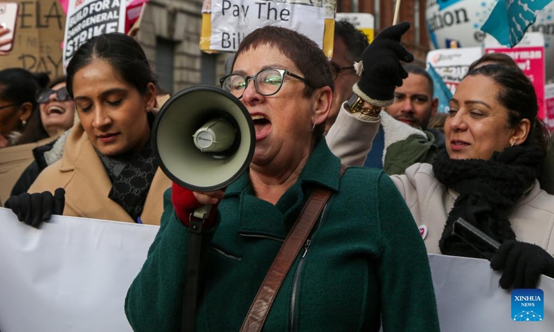 People protest in central London, Britain, on Feb. 1, 2023. Up to half a million British teachers, university staff, train drivers and civil servants went on strike on Wednesday in the largest coordinated action for years amid lengthy disputes over pay.(Photo: Xinhua)