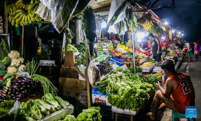 Vegetables and fruits are seen at a market in Quezon City, the Philippines, Feb. 7, 2023. Inflation in the Philippines accelerated to 8.7 percent in January year-on-year, the highest monthly rate since November 2008, the Philippine Statistics Authority (PSA) said on Tuesday.(Photo: Xinhua)