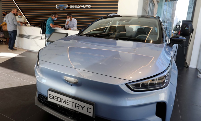 People visit a car company selling electric cars made by China's Geely Auto in Tel Aviv, Israel, on Nov. 10, 2021.(Photo: Xinhua)