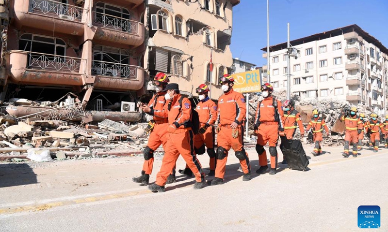 A joint rescue group encompassing members of China Search and Rescue Team and a search and rescue team from the Hong Kong Special Administrative Region (HKSAR) carry out rescue operation among earthquake debris in Antakya, southern province of Hatay, Türkiye, Feb. 14, 2023. China has offered an array of rescue teams and vital items to Türkiye since massive earthquakes and aftershocks jolted the country last week, in an effort to help search for survivors trapped under the rubble.(Photo: Xinhua)