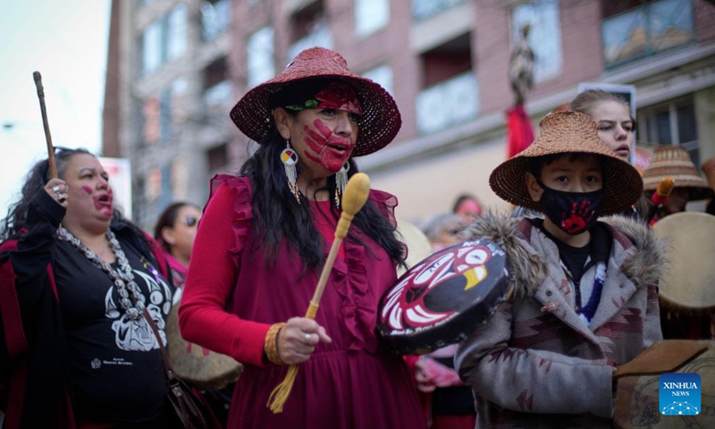 People participate in the Women's Memorial March in Vancouver, British Columbia, Canada, on Feb. 14, 2023. Thousands of people participated in the march to commemorate the missing and murdered indigenous women and girls.(Photo: Xinhua)