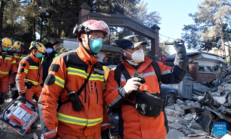 A joint rescue group encompassing members of China Search and Rescue Team and a search and rescue team from the Hong Kong Special Administrative Region (HKSAR) carry out rescue operation among earthquake debris in Antakya, southern province of Hatay, Türkiye, Feb. 14, 2023. China has offered an array of rescue teams and vital items to Türkiye since massive earthquakes and aftershocks jolted the country last week, in an effort to help search for survivors trapped under the rubble.(Photo: Xinhua)