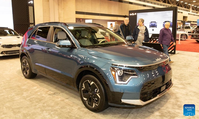 People look at a Kia EV at the North Texas Auto Show in Dallas, Texas, the United States, on Feb.16, 2023. The four-day North Texas Auto Show kicked off in Dallas on Thursday.(Photo: Xinhua)