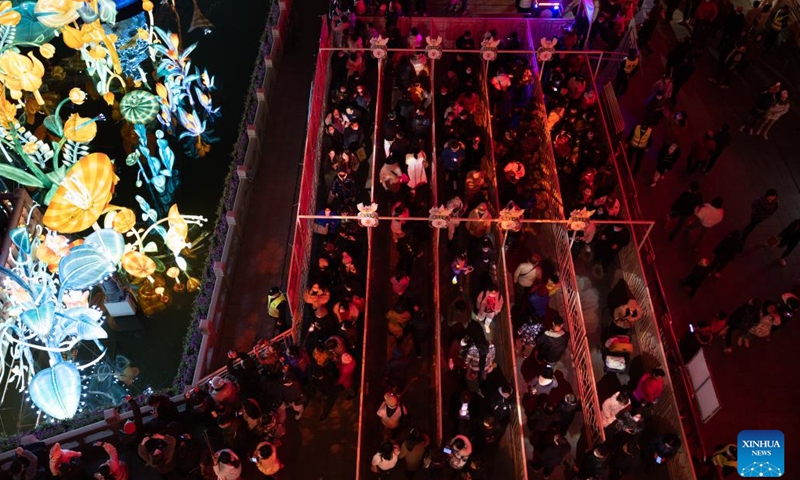 People watch a lantern show at Yu Garden in east China's Shanghai, Feb. 15, 2023. The lantern show lasted from Dec. 26, 2022 to Feb. 15, 2023, which attracted about four million visitors.(Photo: Xinhua)