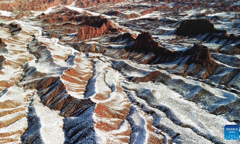 This aerial photo taken on Feb. 20, 2023 shows the snow scenery of Pingshanhu Canyon in Zhangye City, northwest China's Gansu Province.(Photo: Xinhua)