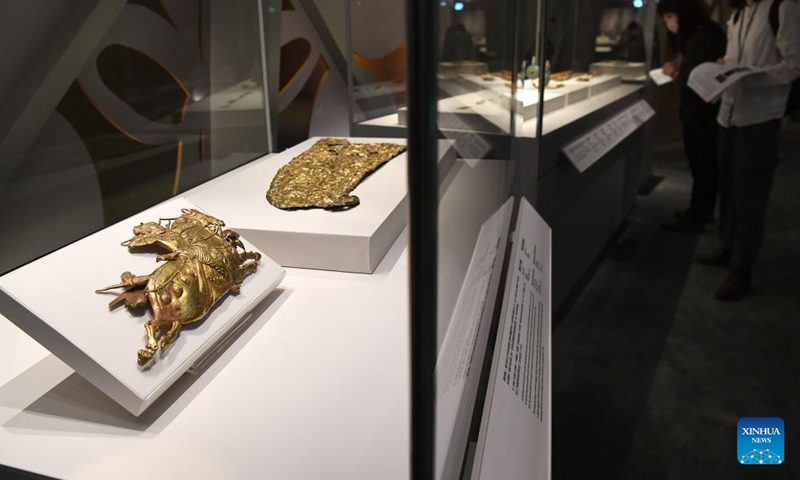 Journalists view the exhibits at the Hong Kong Palace Museum (HKPM) in south China's Hong Kong, Feb. 21, 2023. A special exhibition themed Radiance: Ancient Gold from the Hong Kong Palace Museum Collection and the Mengdiexuan Collection was unveiled here on Tuesday.(Photo: Xinhua)