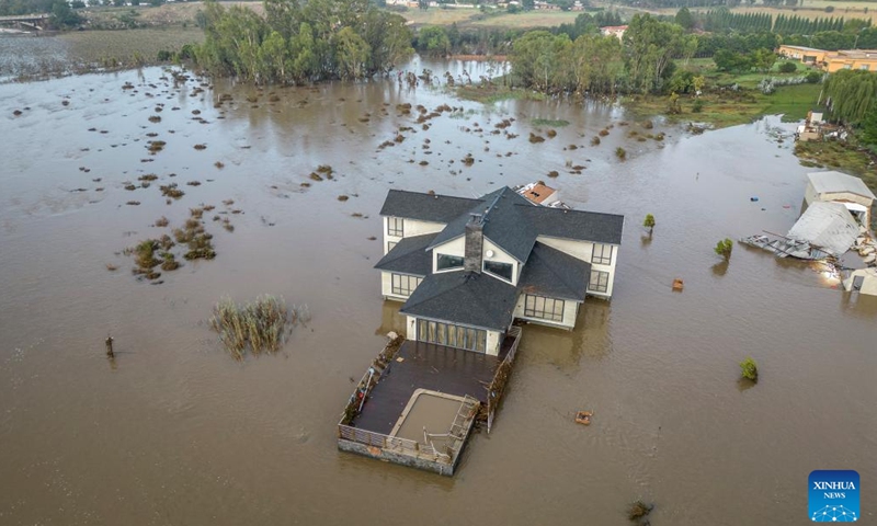 This aerial photo taken on Feb. 19, 2023 shows flooded area in Lochvaal, South Africa. The Vaal dam exceeded its maximum capacity due to heavy rainfall and caused floods in the Vaal River.(Photo: Xinhua)