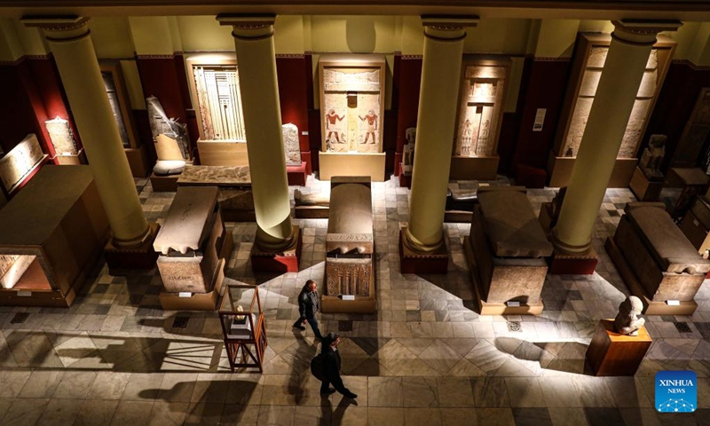 People view antiquities at the Egyptian Museum after its development in Cairo, Egypt, on Feb. 20, 2023. After more than three years of renovation, Egypt has announced the completion of the first development phase of the iconic Egyptian Museum in Cairo (EMC).(Photo: Xinhua)