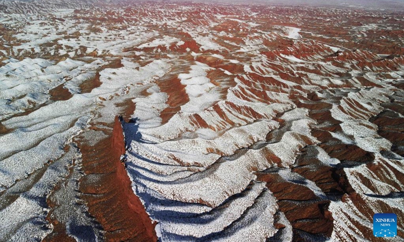 This aerial photo taken on Feb. 20, 2023 shows the snow scenery of Pingshanhu Canyon in Zhangye City, northwest China's Gansu Province.(Photo: Xinhua)