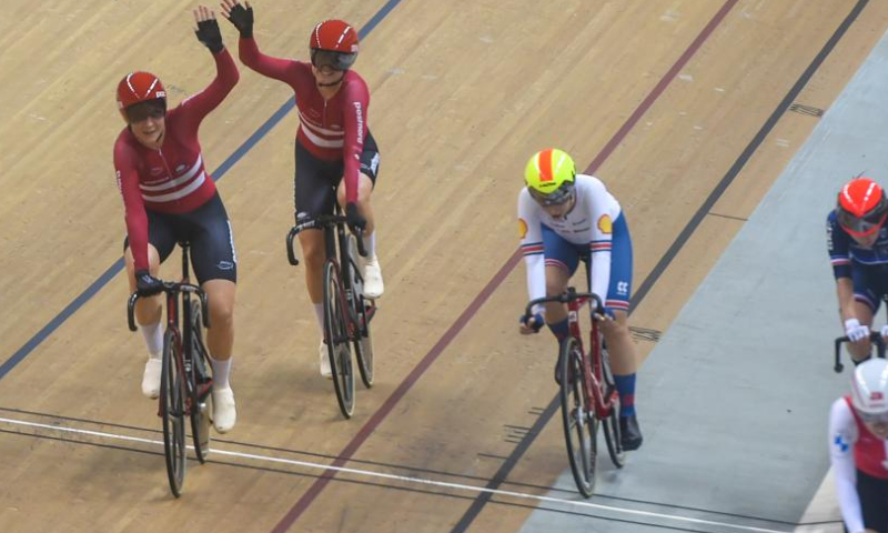 Team Denmark (L) celebrates after winning the women's madison final at the 2023 UCI Track Cycling Nations Cup at the Velodrom in Jakarta, Indonesia, Feb. 25, 2023. (Xinhua/Zulkarnain)