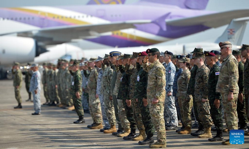 Military personnel attend the opening ceremony at U-Tapao Thai navy airfield in Rayong Province, Thailand, Feb. 28, 2023. According to the Thai Armed Forces, the multinational exercise Cobra Gold 2023 will take place from Feb. 27 to March 10, with the core exercises including command post exercise, humanitarian civic assistance, and field training exercise. The drill is also back to full-scale with the return to normalcy after the pandemic.(Photo: Xinhua)