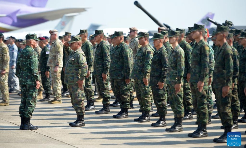 Military personnel attend the opening ceremony at U-Tapao Thai navy airfield in Rayong Province, Thailand, Feb. 28, 2023. According to the Thai Armed Forces, the multinational exercise Cobra Gold 2023 will take place from Feb. 27 to March 10, with the core exercises including command post exercise, humanitarian civic assistance, and field training exercise. The drill is also back to full-scale with the return to normalcy after the pandemic.(Photo: Xinhua)