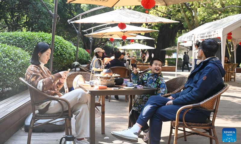 People enjoy their leisure time at a tea house in Suning Plaza in Fuzhou, southeast China's Fujian Province, Feb. 26, 2023. The time-honored tea culture has contributed to the thriving of tea houses in Fuzhou.(Photo: Xinhua)
