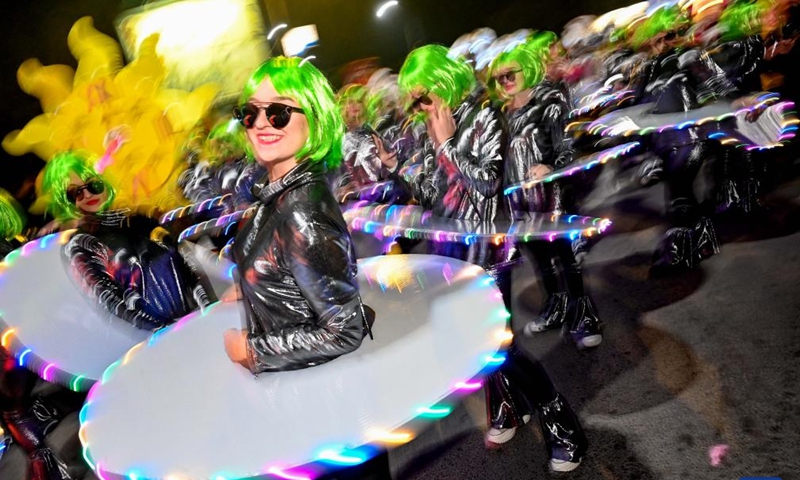 Costumed revelers perform in a carnival procession in Strumica, North Macedonia, on Feb. 25, 2023. (Photo by Tomislav Georgiev/Xinhua)