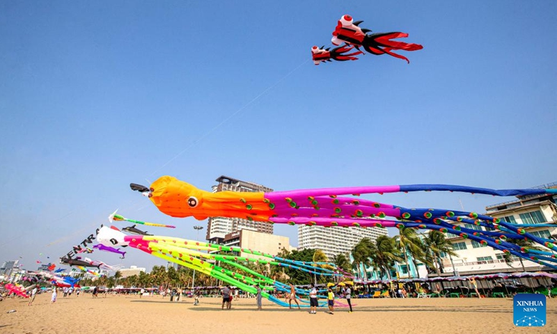 Kites are pictured above the beach in Pattaya, Thailand, Feb. 27, 2023. Kite enthusiasts and tourists gathered at Pattaya Beach to enjoy the international kite festival.(Photo: Xinhua)