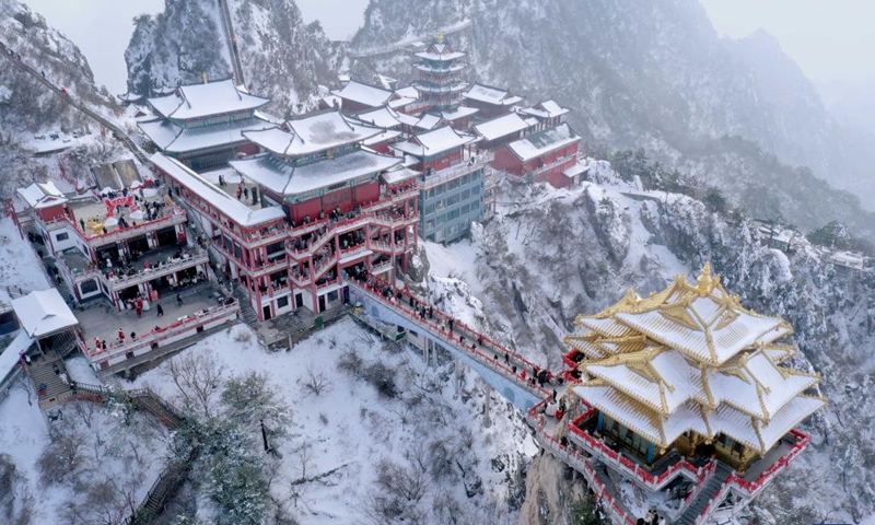 This aerial photo taken on Feb. 23, 2023 shows the scenery of the Laojun Mountain scenic spot in Luanchuan County of Luoyang, central China's Henan Province. Official data showed that the city saw 10.31 million trips in January of 2023, generating 6.28 billion yuan (about 902.44 million U.S. dollars) in revenue, up 746.63 percent and 690.06 percent year on year respectively(Photo: Xinhua)