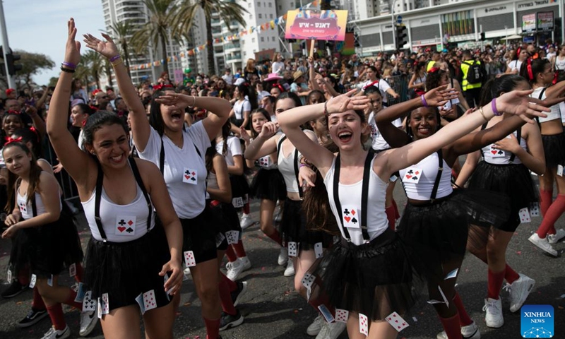 People participate in Adloyada Holon Purim Parade 2023 in Holon, central Israel, on March 7, 2023. Purim is a Jewish holiday that commemorates the deliverance of the Jewish people from Haman's plot during the reign of the ancient Persian Empire, according to the Biblical Book of Esther.(Photo: Xinhua)