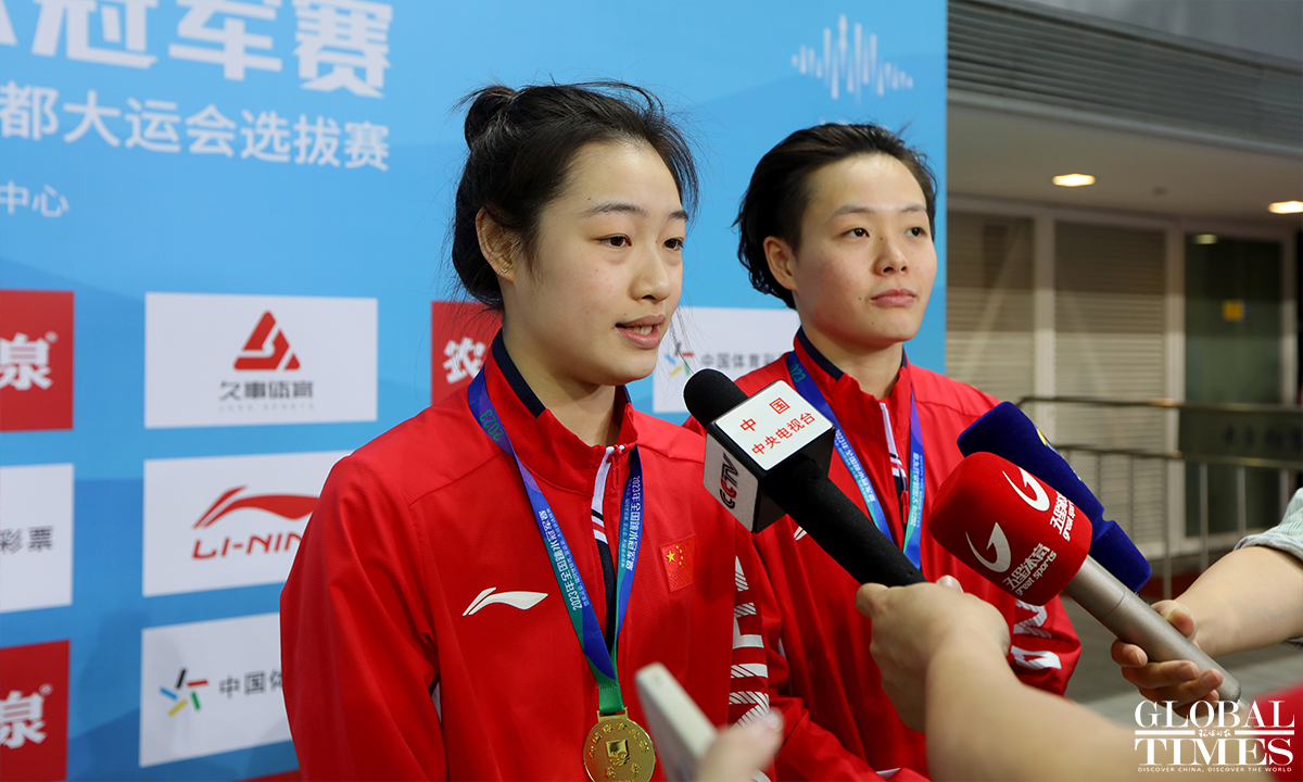 Athletes compete at women’s synchronized 3m springboard match, China