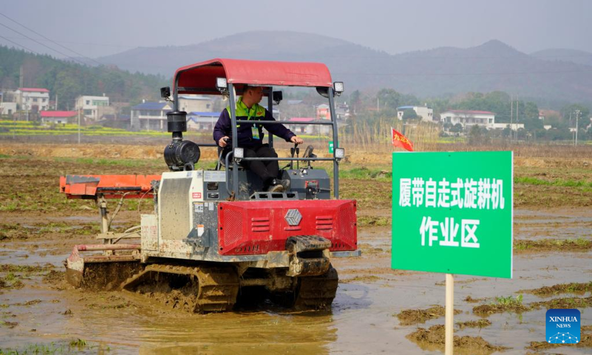 Contestants take part in an agricultural machinery skills competition in Quanhu Village of Longdong Town, Xiangxiang City, Xiangtan, central China's Hunan Province, March 10, 2023. Photo:Xinhua