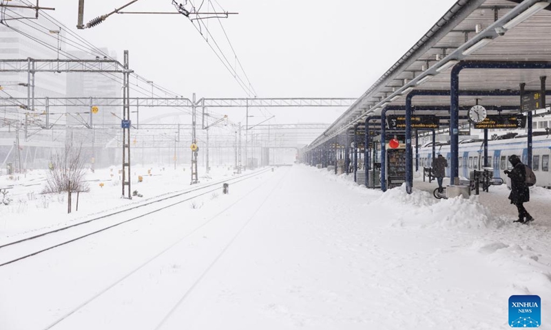 This photo taken on March 8, 2023 shows a snow-covered commuter train station in Stockholm, Sweden. Public transport in and around the Swedish capital was severely disrupted on Wednesday as heavy blizzards swept across the country.(Photo: Xinhua)