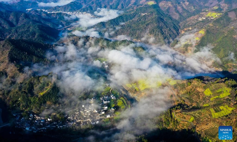 This aerial photo taken on March 14, 2023 shows the scenery of a sea of clouds at Shitan Village in Shexian County of Huangshan City, east China's Anhui Province.(Photo: Xinhua)