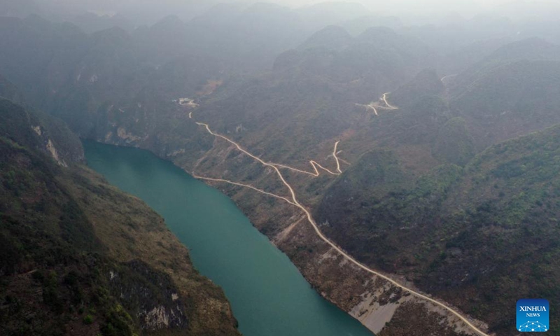 This aerial photo taken on March 20, 2023 shows Hongshui River, the water source of the drought resisting emergency water supply project in Bahao Village in Bansheng Township, Dahua Yao Autonomous County, south China's Guangxi Zhuang Autonomous Region.(Photo: Xinhua)