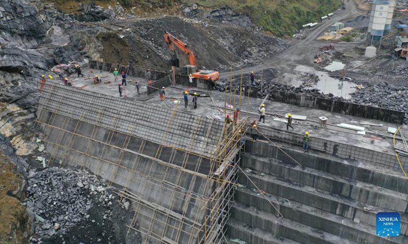 This aerial photo taken on March 15, 2021 shows the Wanglie reservoir construction site in Qibainong Township, Dahua Yao Autonomous County, south China's Guangxi Zhuang Autonomous Region. Situated at the center of the Karst landforms in west Guangxi, Dahua Yao Autonomous County had suffered from severe water deficit for ages.(Photo: Xinhua)