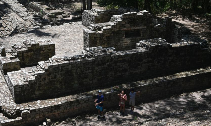 Tourists visit the Maya site of Copan in Honduras, April 1, 2023. The city of Copan, with its temples, squares, terraces and other characteristics, is an excellent representation of Classic Mayan civilization. (Xinhua/Xin Yuewei)

