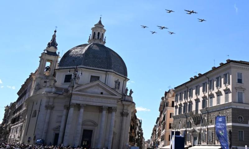 An air echelon of Italian Air Force flies over Piazza del Popolo during celebrations marking the centenary of the Italian Air Force in Rome, Italy, on March 28, 2023. (Photo by Alberto Lingria/Xinhua)