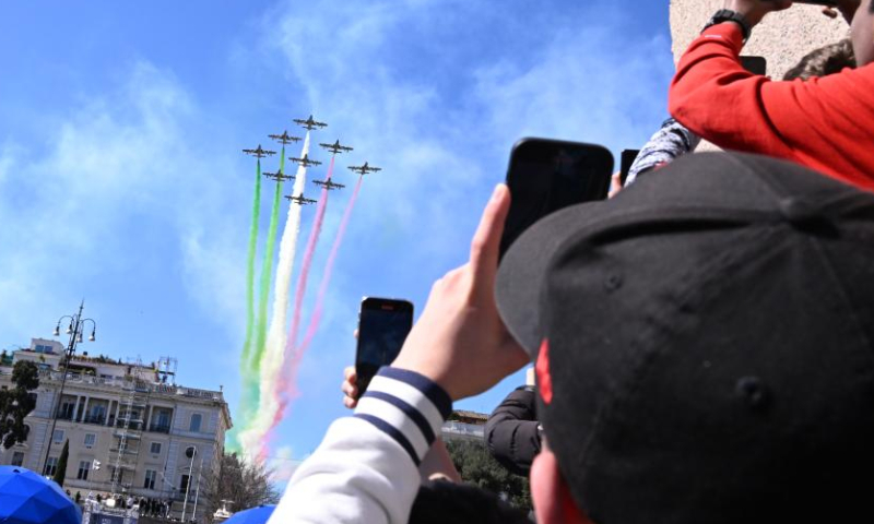 The Italian Frecce Tricolori aerobatic squad performs during celebrations marking the centenary of the Italian Air Force in Rome, Italy, on March 28, 2023. (Photo by Alberto Lingria/Xinhua)