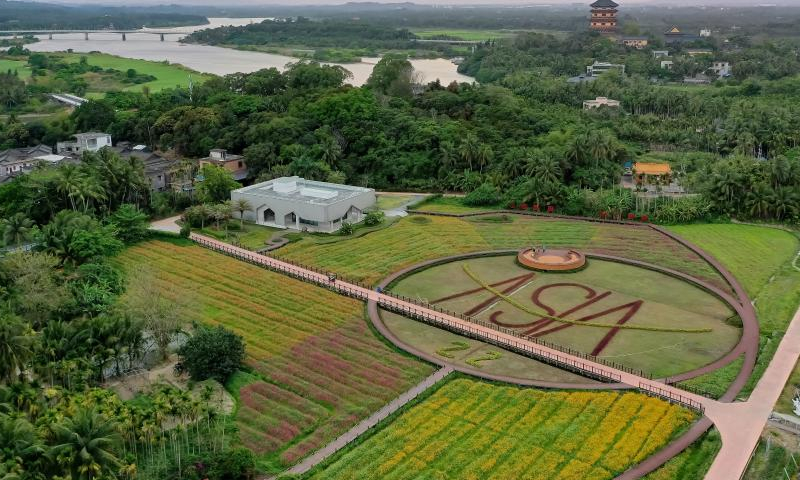 This aerial photo taken on March 24, 2023 shows a view of Nanqiang Village in Boao, south China's Hainan Province. The Boao Forum for Asia will hold its annual conference from March 28 to 31 in Boao, a coastal town in China's island province of Hainan. With constant efforts of local government in recent years to build beautiful villages in this town, Shamei, Mocun and Nanqiang villages have gradually become models of harmonious villages here. (Xinhua/Guo Cheng)