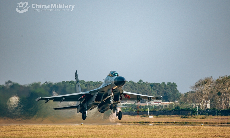 A fighter jet attached to a naval aviation brigade under the PLA Southern Theater Command takes off for a day-and-night flight training exercise in early March, 2023. (eng.chinamil.com.cn/Photo by Fu Jinquan)