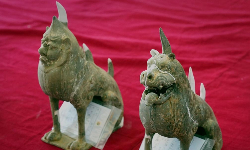 This photo taken on March 15, 2023 shows pottery tomb-guarding beasts unearthed in a cemetery found in Zhucang Village in Mengjin District of Luoyang City, central China's Henan Province. A cemetery consisting of three tombs was recently listed as one of the five key archaeological discoveries in Henan Province in 2022.(Xinhua/Li An)