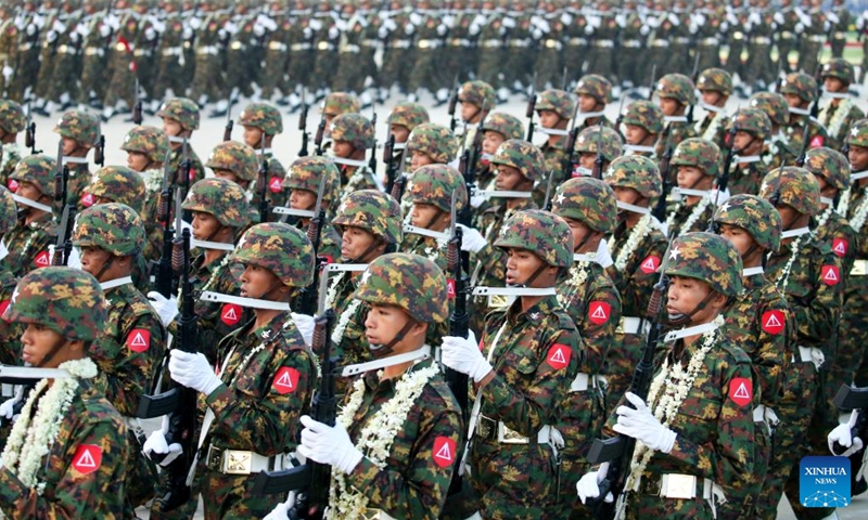 Soldiers march during a military parade to mark the 78th Armed Forces Day in Nay Pyi Taw, Myanmar, March 27, 2023. Myanmar celebrated its 78th Armed Forces Day on Monday with a military parade in the capital Nay Pyi Taw in commemoration of the start of its anti-fascist movement during World War II. (Photo by Myo Kyaw Soe/Xinhua)