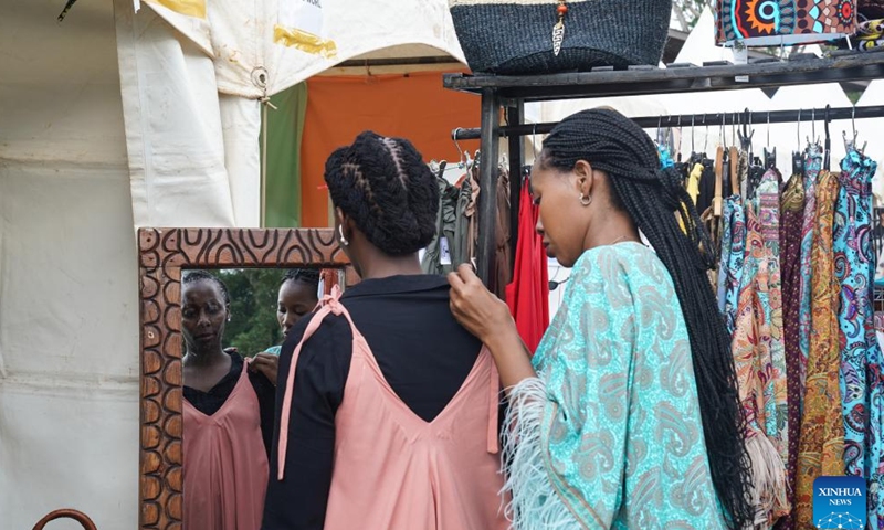 People shop at an Easter market in Nairobi, Kenya, April 1, 2023. An Easter market is held here from April 1 to 2, which attracts lots of visitors. (Xinhua/Han Xu)